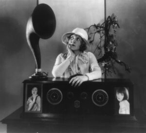 Clara Horton tuned in on a concert with her receiver, 1925